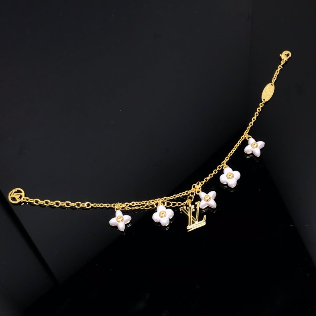 [Everoly JW]LOGO 6 MOTIF STAR AND SUN GOLD BRACELET